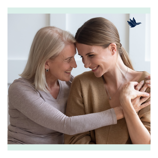 Mother and daughter hugging